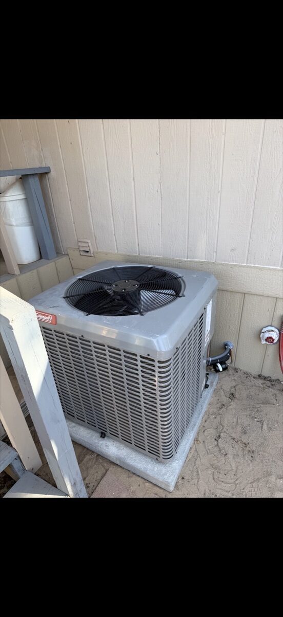 Air Control Services technician working on residential HVAC in the south Mesilla Valley