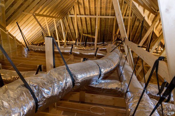 Insulated flexible ductwork running through a residential attic