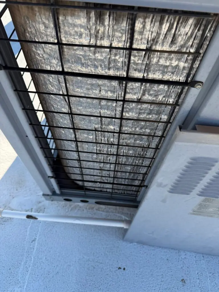 Dirty AC coil before cleaning during Las Cruces tune-up service